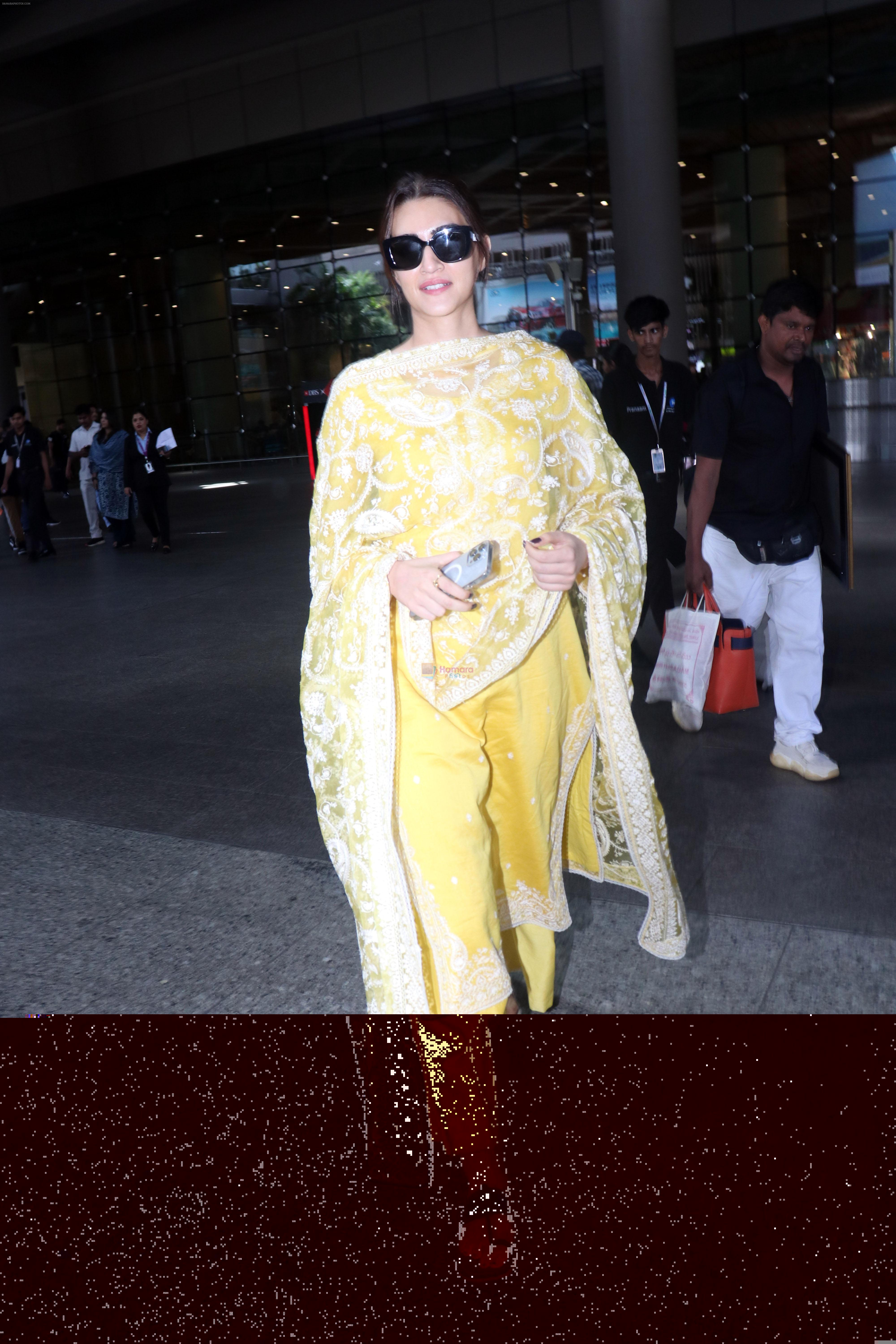 Kriti Sanon Dressed In Yellow Churidar Wearing Black Sunglasses Kriti Sanon Bollywood Photos